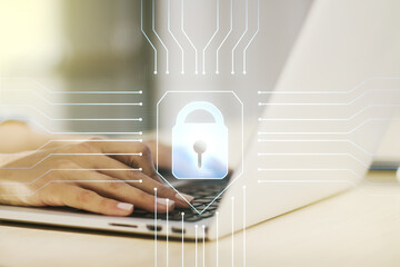 Aufkleber - Double exposure of creative lock hologram with chip and hands typing on laptop on background. Information security concept
