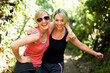 © Tetra Images - Portrait of two blond women in forest