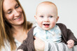 © Jessica Peterson/Tetra Images - Mother holding baby son (6-11 months)