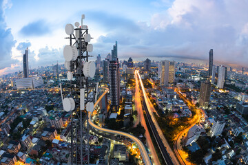 Wall Mural - Telecommunication tower with 5G cellular network antenna on nice city background