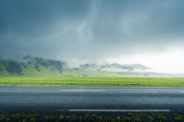 Wall Mural - Icelandic landscape with asphalt road