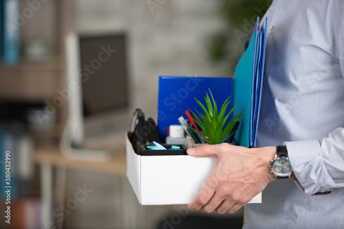 Cuadros en Lienzo cropped view of person carrying box of workplace possessions