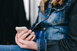© Gillian Vann/Stocksy - girl with mobile phone in her hand