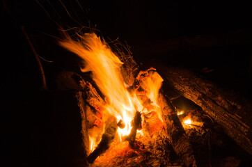 embers burn down in a hardwood fire