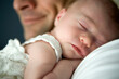© Dina Marie Photography/Stocksy - Father Holding Sleeping Baby Girl Over His Shoulder