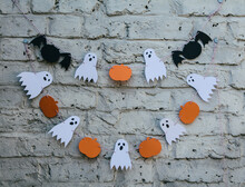 Halloween Decoration Against A Grunge Brick Wall.