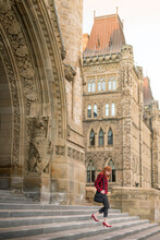 Woman Public Service Worker Leaving Work At Parliament Hill Ottawa Canada Under Peace Tower