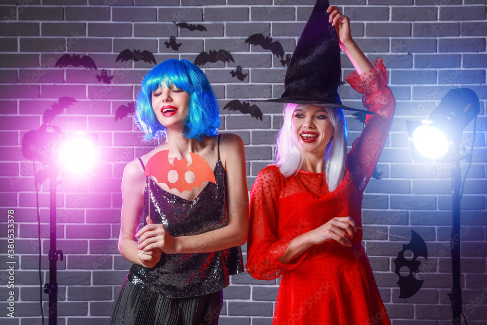 Beautiful young women at Halloween party