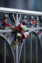 Love Locks On The Railing Of A Bridge
