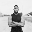 © Jakob Lagerstedt/Stocksy - Portrait of a muscular african american athlete