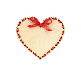 Wall Mural - Wooden heart with red ribbon decoration isolated on white