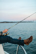 © Matthew Spaulding/Stocksy - Man fishing on boat
