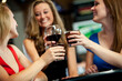 © Sean Locke Photography/Stocksy - Bar: Girls Doing a Celebration Toast
