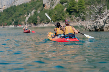 Wall Mural - CONGOST DE MONT REBEI, SPAIN - Sep 15, 2020: Kayak in the lake in  Montrebei gorge in Catalonia, Spain in sum