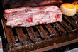 ribs on the grill for an Argentinean barbecue asado