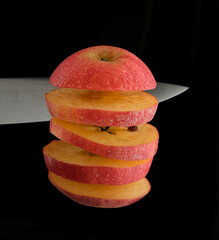 Sticker - apple sliced with a knife, levitation