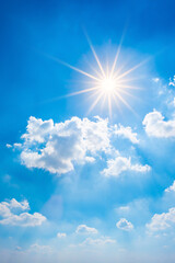 blue summer sky with bright sun