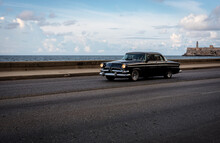 Classic Car Driving In La Havana, Cuba