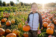 © Take A Pix Media/Stocksy - Asian Boy Holding a Pumpkin