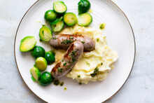 Sausages With Mashed Potatoes And Roasted Brussels Sprouts