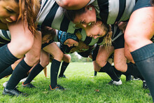 Close Up Of A Female Rugby Players In A Scrum.