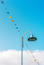 Colorful Banners On Lamp Post