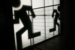 © Hakan & Sophie/Stocksy - Pictogram of two running people