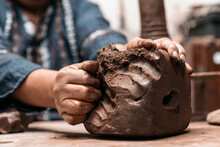Mexican Artisan Sculpting With Mud