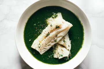 Fish fillet with vegetable sauce