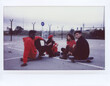 © Guille Faingold/Stocksy - Stylish multiracial skaters resting on parking lot