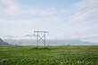 © Tanya Yatsenko/Stocksy - Transmission towers in Iceland