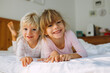 © Tanya Yatsenko/Stocksy - Two sisters in pyjamas