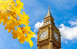 Fototapeta Londyn - Big Ben tower of Houses of Parliament in autumn, London, UK