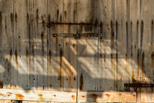 Weathered Wooden Door With Rusty Metal Bolt On Sunny Day In Sa Caleta