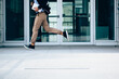 © Michela Ravasio/Stocksy - Young business man running