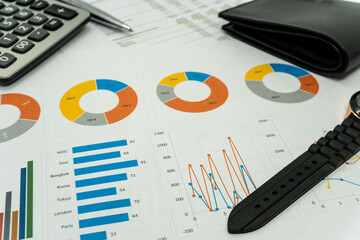 business report with pen statement with graph and data analysis