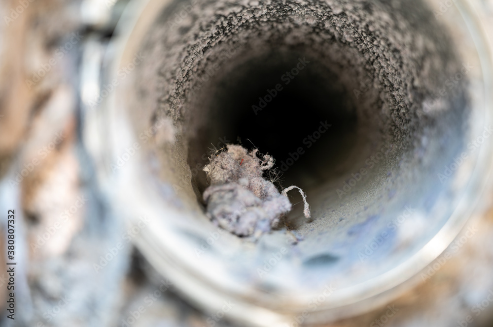 Interior view of dryer vent line with lint and dust buildup - obrazy, fototapety, plakaty 