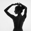 © Jacob Lund/Stocksy - Silhouette of beautiful naked woman
