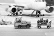 © Per Swantesson/Stocksy - Rushed transport of luggage at airport