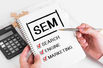Poster - businessman writing sem concepts on his note