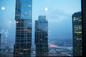 Buildings made of glass and concrete. Skyscrapers in the city.