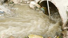 Dirty Water Discharged Into River