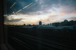 © Julia Forsman/Stocksy - View from a train window in London at dusk.