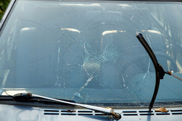 Poster - car with broken windshield close-up. road accident
