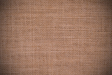 Wall Mural - Rough hessian background with flecks of varying colors of beige and brown. with copy space. office desk concept, Hessian sackcloth burlap woven texture background.