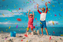 Happy Boy And Girl Celebration On Beach
