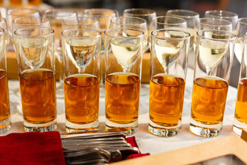 Canvas Print - Restaurant serving, glasses with wine and juice in a row