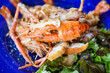 © Bigc Studio - Close up shellfish seafood plate shrimp prawns dinner food cooked - Grilled shrimps with vegetables and cheese