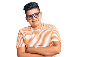 Little boy kid wearing casual clothes and glasses happy face smiling with crossed arms looking at the camera. positive person.