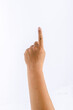 © tkroot - Close up of hand with show finger pointing at something, Isolated on white background.